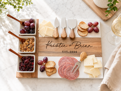 Personalized cheeseboard with various foods on a marble surface